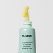 ProtoClinical k-beauty heimish Retinol 0.1% Eye Serum 30ml single upright serum bottle centered on a light background with pale green top shading and warm peach side accents.
