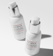 ProtoClinical k-beauty medicube Medicube Red Serum Plus 2.0 55ml two white serum bottles with silver pumps angled on a clean white background with soft shadows