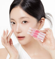 ProtoClinical k-beauty MEDICUBE: PDRN Pink One Day Serum 1box(1.5ml*) (10Units) model portrait holding three pink serum ampoules beside her cheek against a white background