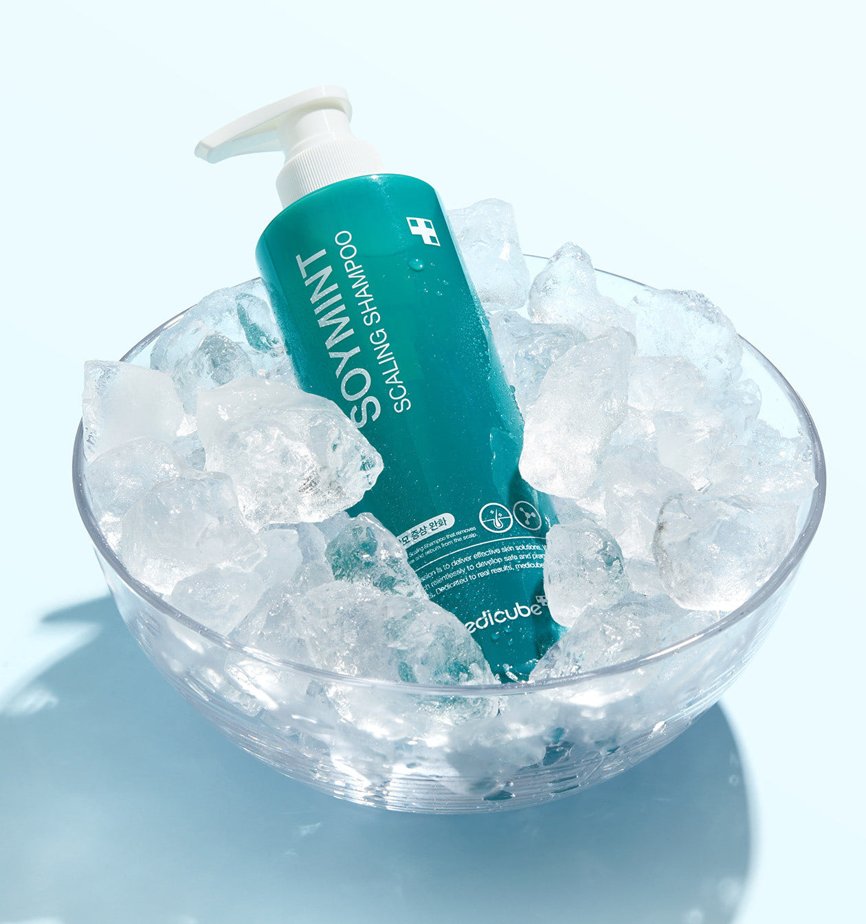 ProtoClinical k-beauty teal beauty product silhouette on a light background with pale blue lower tones.