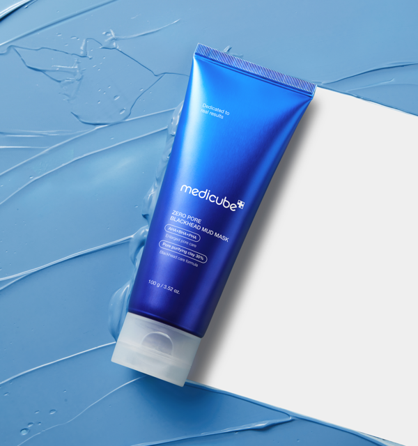 ProtoClinical k-beauty MEDICUBE: Zero Pore Blackhead Mud Mask (100g) single tall blue container centered vertically on a pale aqua and cream background