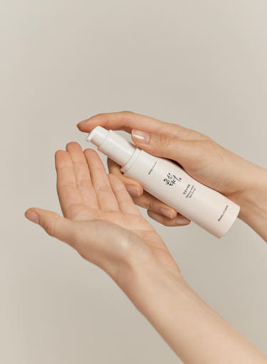 ProtoClinical k-beauty [Beauty of Joseon] Ginseng Moist Sun Serum 50ml (SPF50+ PA++++) multiple upright sun serum packages side by side on a light background