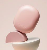 ProtoClinical k-beauty MEDICUBE: Pro Glutathione Glow Cushion Spf50 (15g) warm beige beauty product silhouette on a soft peach background.