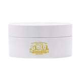ProtoClinical k-beauty Elizavecca Milky Piggy Hell-Pore Gold Hyaluronic acid eye patch 60ea/90g single gold eye patch jar centered on a soft peach background
