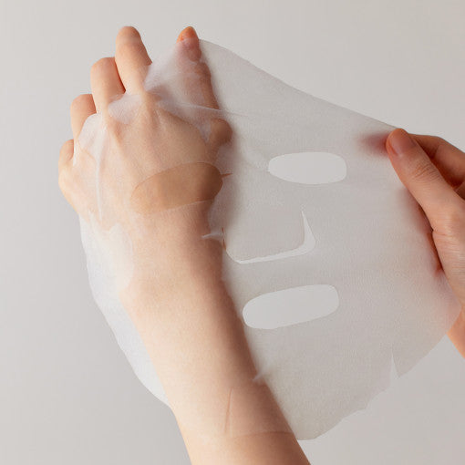 ProtoClinical k-beauty [SOME BY MI] Retinol Intense Daily Mask 30 Sheets/350ml translucent white sheet mask stretched between two hands on a light gray background