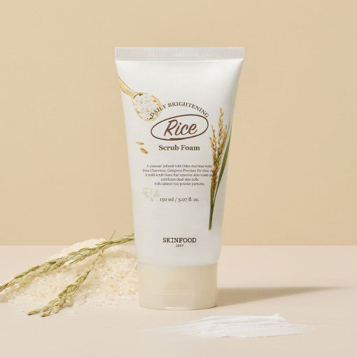 SKINFOOD Rice Daily Brightening Scrub Foam 150ml by ProtoClinical displayed in a centered product packshot with visible label details on a white background for a k-beauty cleansing routine.