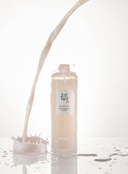ProtoClinical k-beauty [Beauty of Joseon] Glow Replenishing Rice Milk 150ml single upright pale gray bottle centered on a white background with soft gray side shading