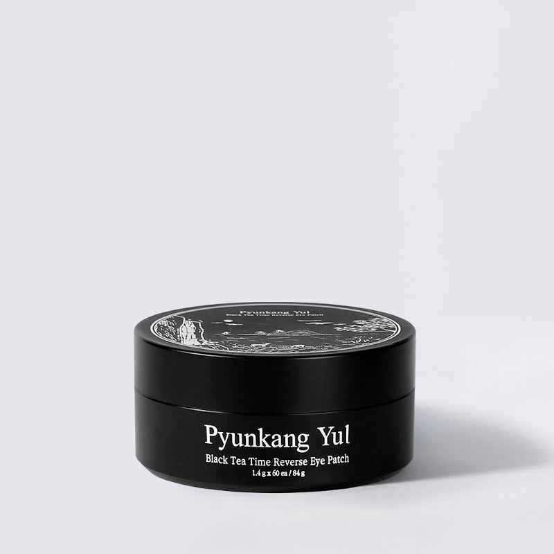 ProtoClinical k-beauty [Pyunkang Yul] Black Tea Time Reverse Eye Patch 60ea/84g tall white product box with a dark lower band centered on a pale lavender background