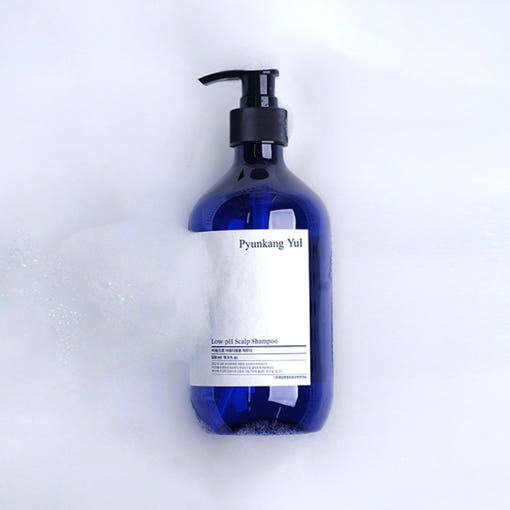 [Pyunkang Yul] Low pH Scalp Shampoo 500ml by ProtoClinical shown in a detailed bottle packshot on a clean white background, highlighting the label and packaging for a k-beauty hair care routine.