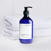 ProtoClinical k-beauty [Pyunkang Yul] Low pH Scalp Treatment 500ml single upright dark blue treatment bottle centered on a light background