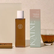 ProtoClinical k-beauty KAINE Kombu Balancing Ampoule Toner 150ml amber skincare bottle graphic on a light background.