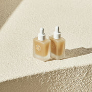 ProtoClinical k-beauty KAINE Kombu Barrier Ampoule 30ml warm amber circular beauty graphic with pale blue side shading on a light background.