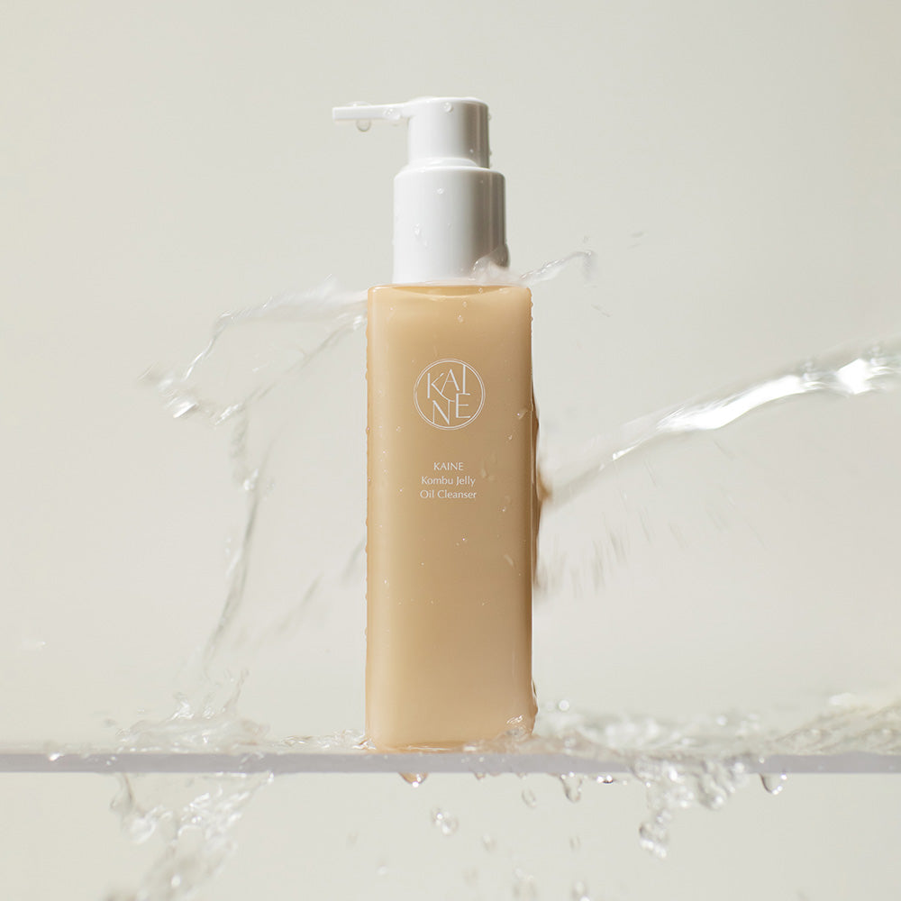 ProtoClinical k-beauty tall beige skincare product centered on a pale blue and cream background.
