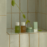 ProtoClinical k-beauty skincare product packaging on a light background.