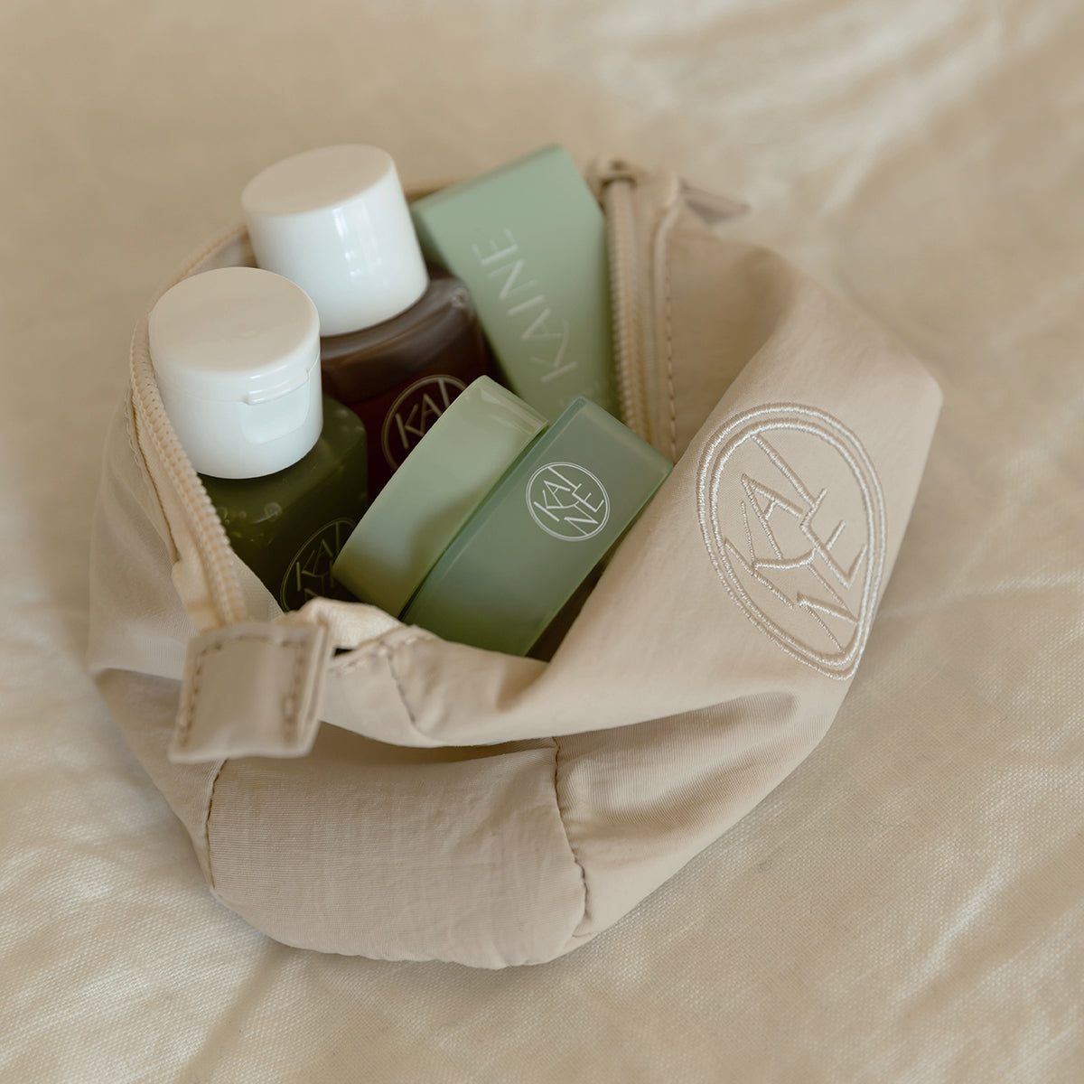 ProtoClinical k-beauty skincare product packaging on a light background.
