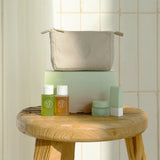 ProtoClinical k-beauty skincare product packaging on a light background.