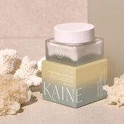 ProtoClinical k-beauty tall taupe skincare product on a soft pink and cream background.