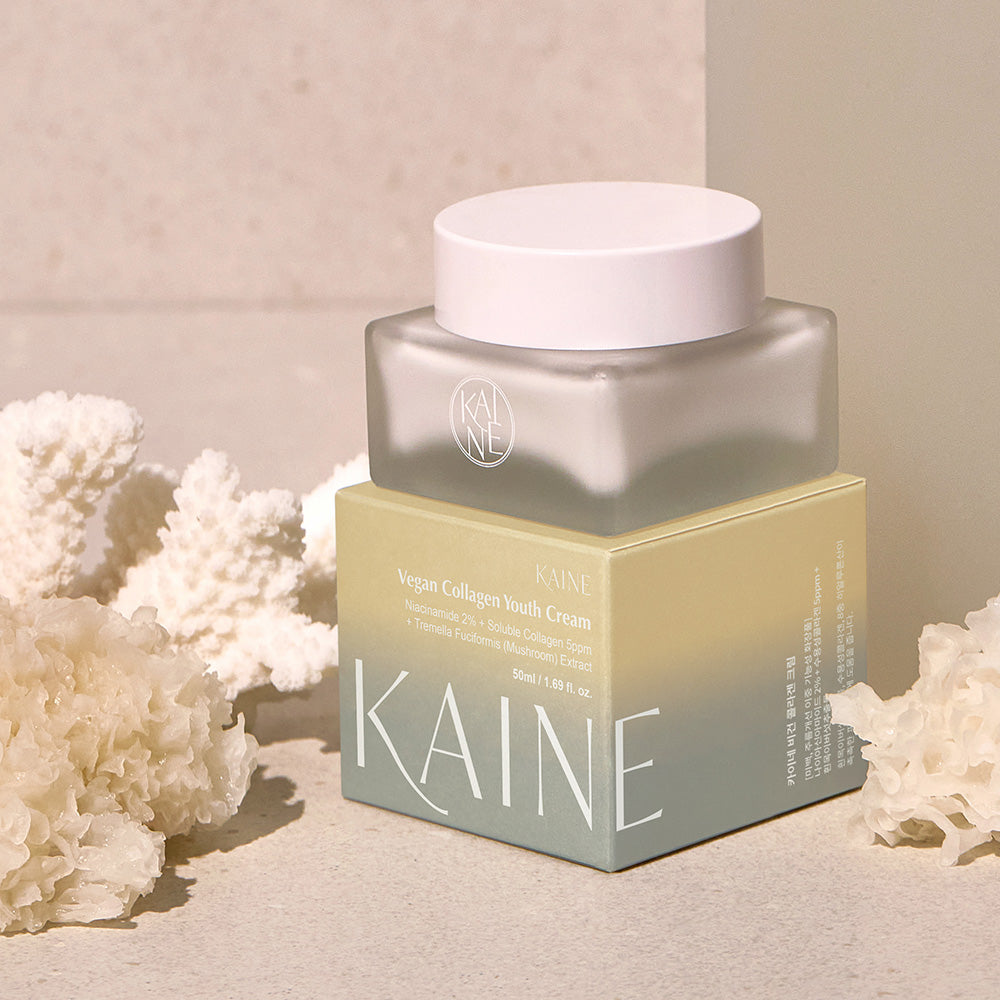 ProtoClinical k-beauty tall taupe skincare product on a soft pink and cream background.