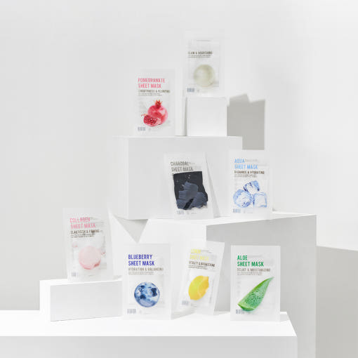 ProtoClinical k-beauty product packaging on a light background.