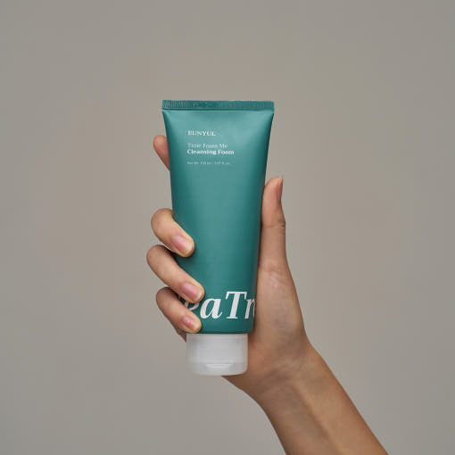 ProtoClinical k-beauty EUNYUL Time Foam Me Tea Tree Cleansing Foam 150ml single dark teal cleansing foam tube centered on a pale gray and peach background