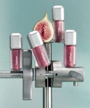 ProtoClinical k-beauty Oddtype Unseen Blur Tint (562, 655, 788) single upright lip tint tube centered on a pale pink and beige background
