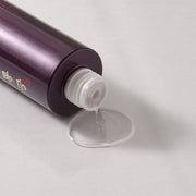 ProtoClinical k-beauty EUNYUL Premium Skin Toner 200ml single upright purple toner bottle centered on a pink-lilac background