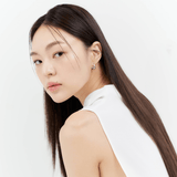 ProtoClinical k-beauty MUZIGAE MANSION Icy Glow 5ml single beige cylindrical bottle with a darker brown cap standing upright on a white background with pale lavender edges