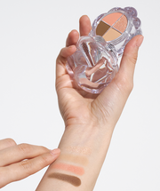ProtoClinical k-beauty rosy brown beauty product silhouette centered on a pale background with soft blue side accents.