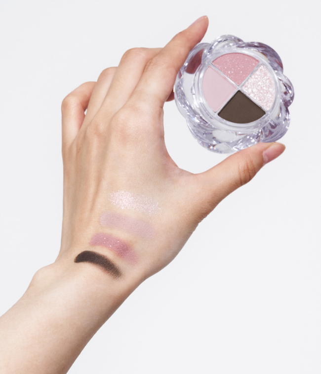 ProtoClinical k-beauty warm tan beauty product silhouette on a pale background with a soft brown upper-right accent.