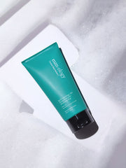 ProtoClinical k-beauty green beauty product packaging on a pink and white background.