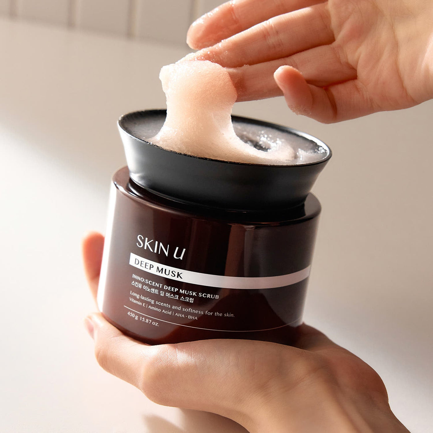ProtoClinical k-beauty mauve beauty detail with a warm brown vertical form on a light background.