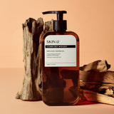 ProtoClinical k-beauty SKIN U INNO:SCENT Shower Gel 500g #COMFORT WOODY single shower gel package with a dark brown top block and a wide dark brown base on a tan background.