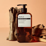 ProtoClinical k-beauty SKIN U INNO:SCENT Shower Gel 500g #COMFORT WOODY single shower gel package with a dark brown top block and a wide dark brown base on a tan background.