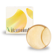 ProtoClinical k-beauty pale yellow beauty packaging silhouette with soft tan and blue corner accents on a light background.