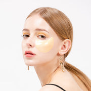 ProtoClinical k-beauty soft peach beauty bottle silhouette with pale blue and cream side accents on a light background.