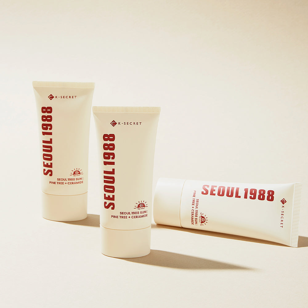 ProtoClinical k-beauty K-SECRET SEOUL 1988 Sun : Pine Tree + Ceramide 50ml product packaging on a warm beige background.