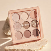 ProtoClinical k-beauty [MACQUEEN New York] 1001 Tone-On-Tone Shadow Palette Pro 9 9g #Nude Mood single eyeshadow palette compact on a clean background