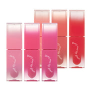 ProtoClinical k-beauty [MACQUEEN New York] Dewy Over Lip Gloss (6 Colors) single wide pink lip gloss swatch with a deeper berry area on a pale mint and cream background