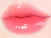 ProtoClinical k-beauty [MACQUEEN New York] Dewy Water Glow Lip Tint 3.5g (9 Color) single coral-pink lip tint swatch in a rounded teardrop shape on a pale blue and mint background