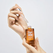 ProtoClinical k-beauty [I'm Sorry For My Skin] Honey Beam Ampoule 30ml slim beige upright bottle centered on a white background with pale aqua side accents