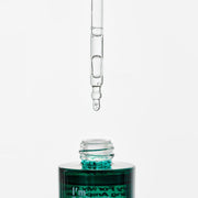 ProtoClinical k-beauty [I'm Sorry For My Skin] Relaxing Ampoule 30ml close-up of a glass dropper above the open teal bottle neck on a white background