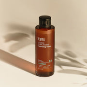 ProtoClinical k-beauty acwell Licorice pH Balancing Cleansing Toner 150ml single upright toner bottle in dark brown packaging on a light background.