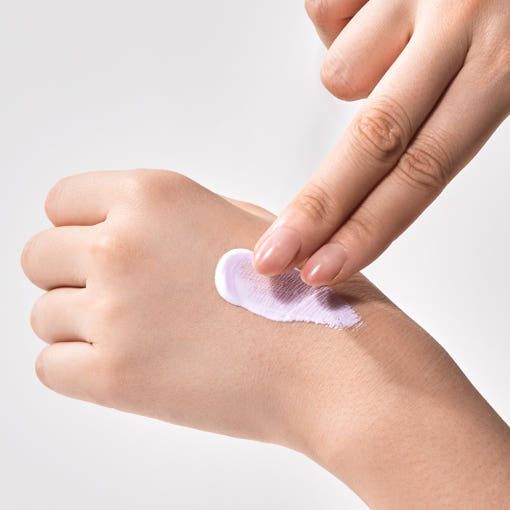 ProtoClinical k-beauty soft pink and peach beauty product detail on a light background.