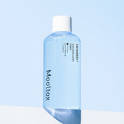 ProtoClinical k-beauty MEDIPEEL Hyaluronic Acid Layer Mooltox Toner 300ml pale blue toner packaging silhouette centered on a light background