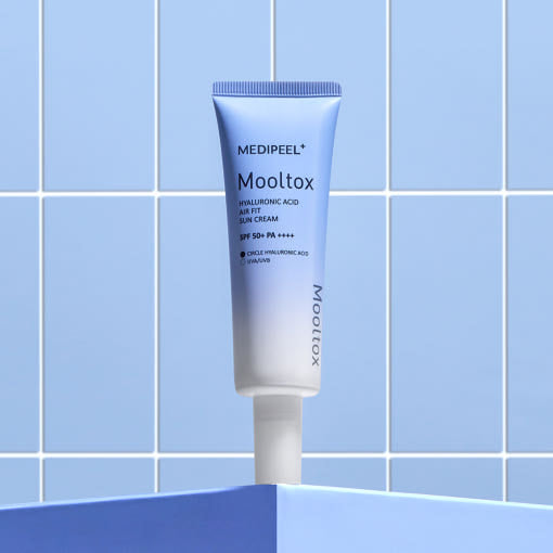 ProtoClinical k-beauty blue beauty product detail with vertical tones on a pale background.