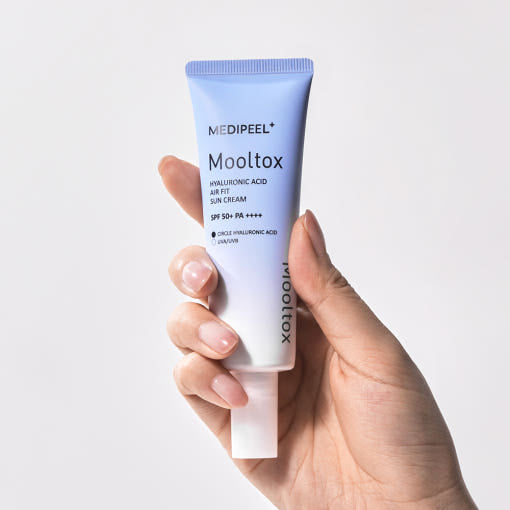 ProtoClinical k-beauty pale lavender beauty product detail on a soft peach background.