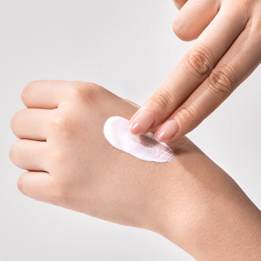 ProtoClinical k-beauty soft pink and peach beauty product detail on a light background.