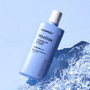 ProtoClinical k-beauty blue beauty product detail on a pale blue background.