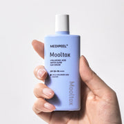 ProtoClinical k-beauty pale blue and gray beauty product detail on a light background.