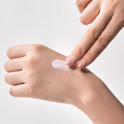 ProtoClinical k-beauty warm beige beauty product detail with vertical tones on a light background.